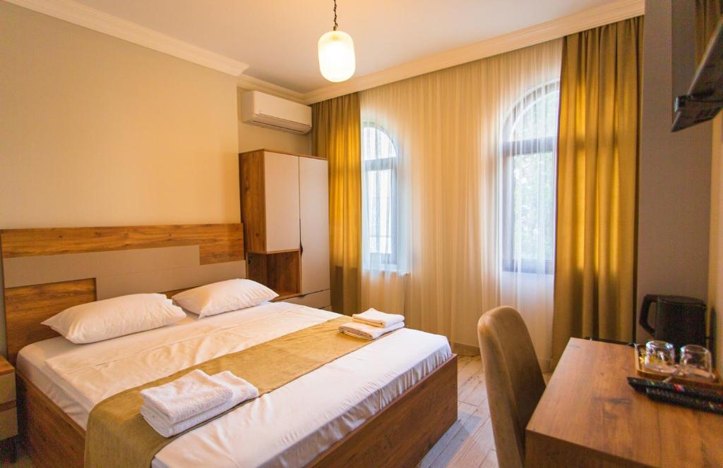 Postel nebo postele na pokoji v ubytování Memory