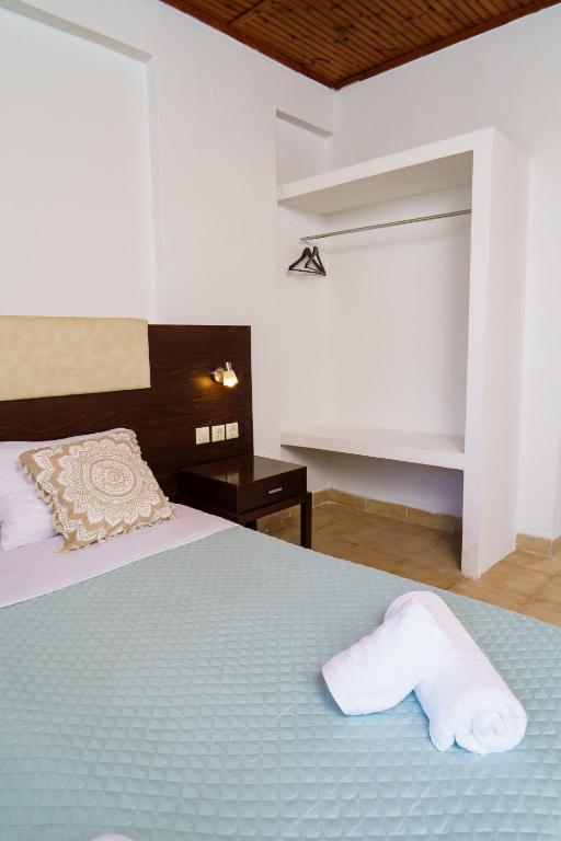 Postel nebo postele na pokoji v ubytování MaYo Rooms Zakynthos