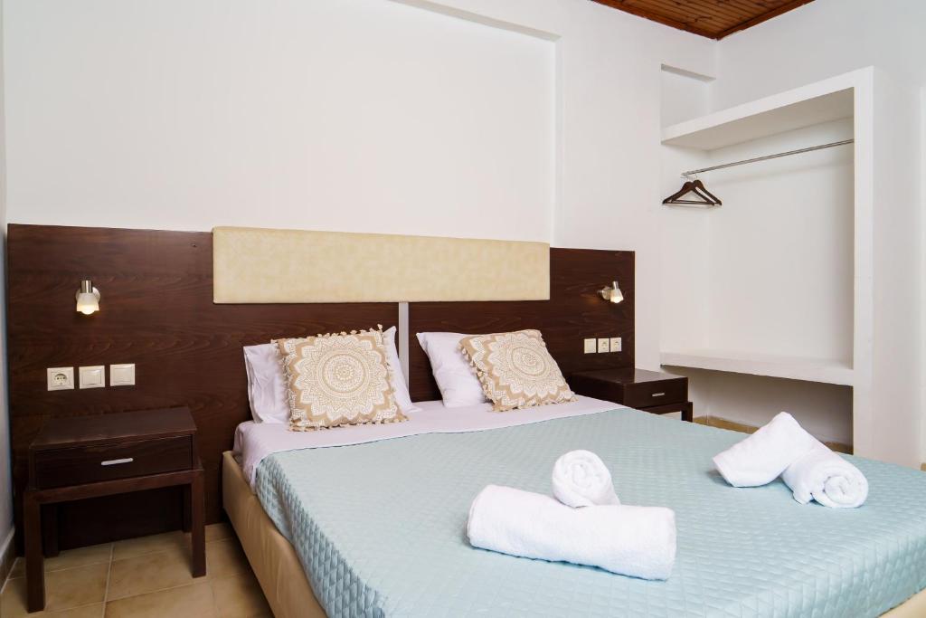 Postel nebo postele na pokoji v ubytování MaYo Rooms Zakynthos