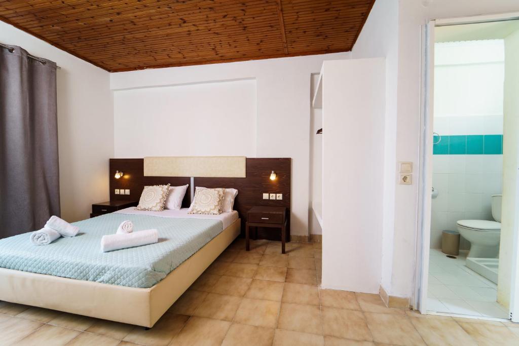 Postel nebo postele na pokoji v ubytování MaYo Rooms Zakynthos