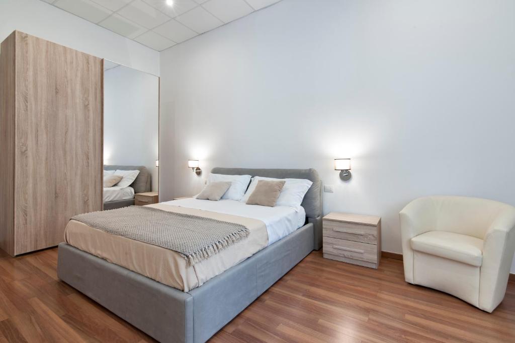 Postel nebo postele na pokoji v ubytování Suite San Biagio