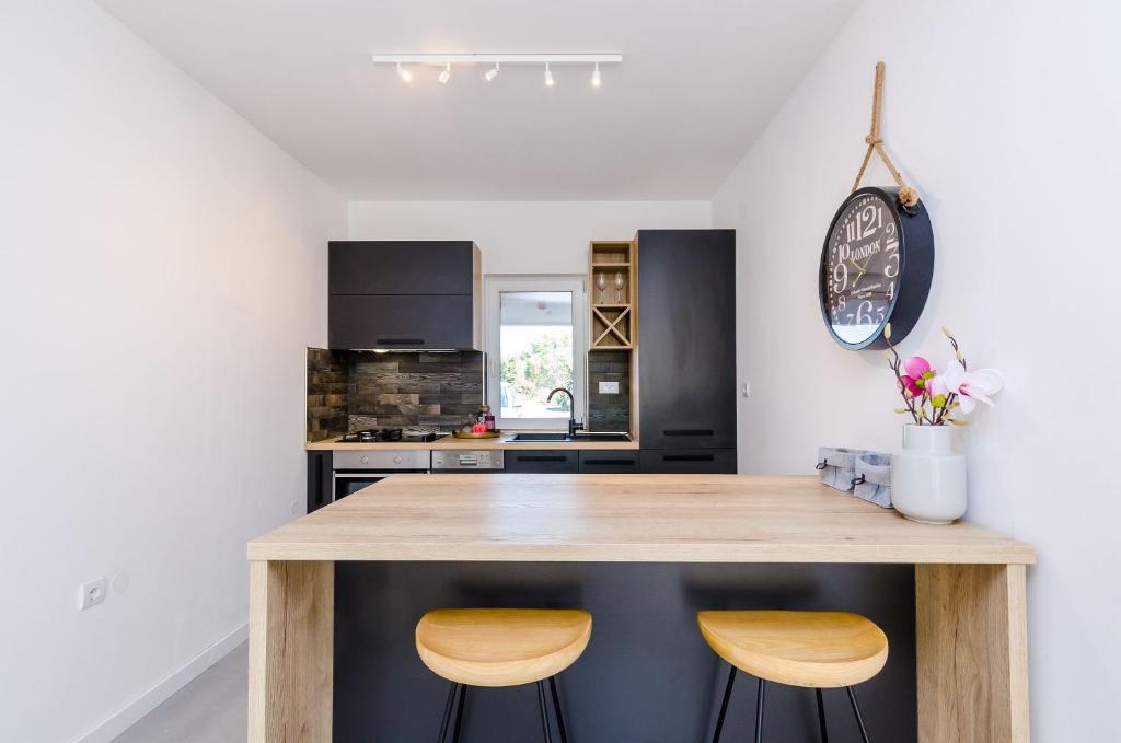 Kuchyňa alebo kuchynka v ubytovaní Apartment Sea Shell