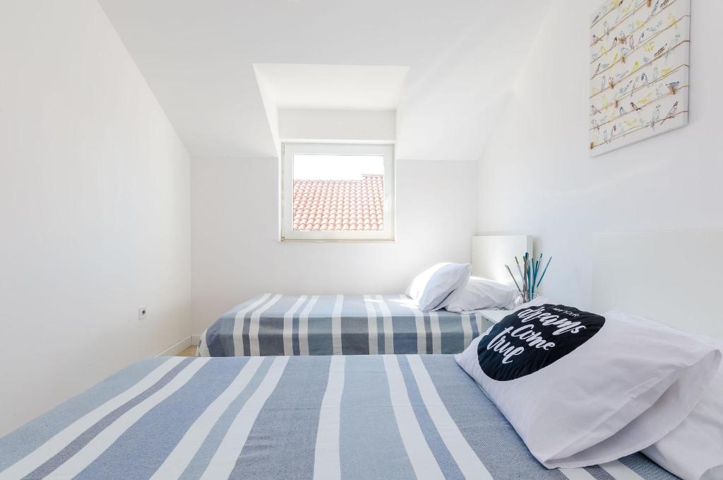 Posteľ alebo postele v izbe v ubytovaní Apartment Sea Shell