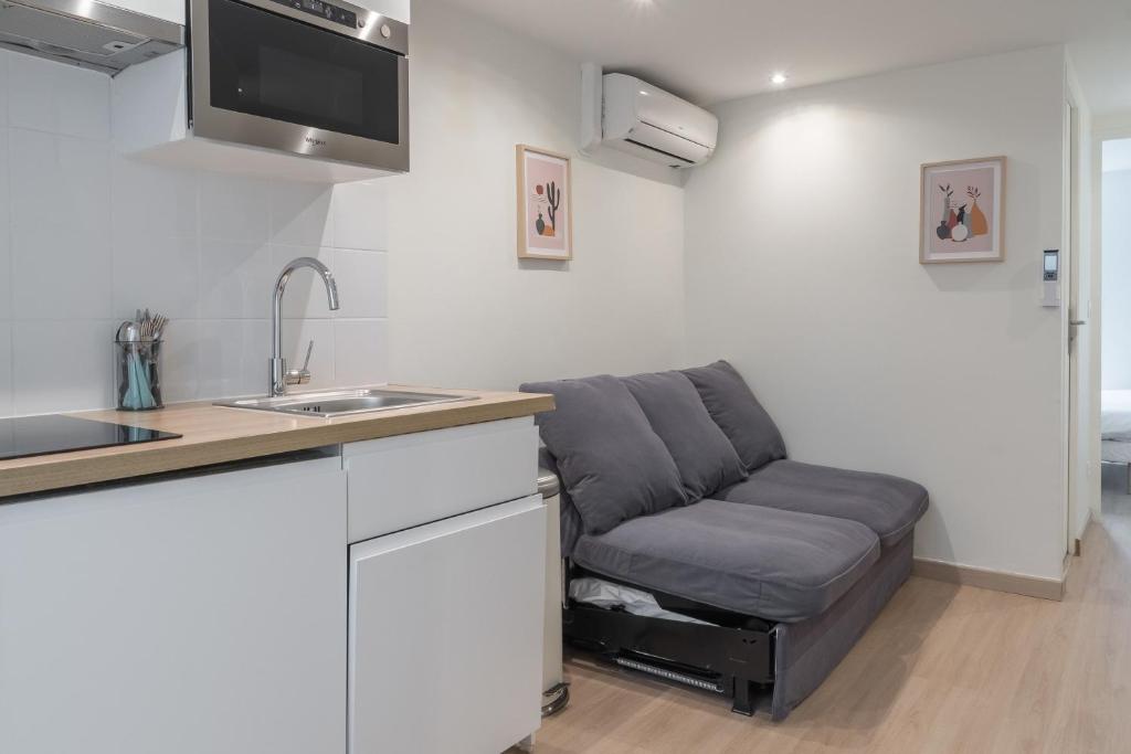 Kuchyňa alebo kuchynka v ubytovaní Lavie Maison Parisian Aircon Gem