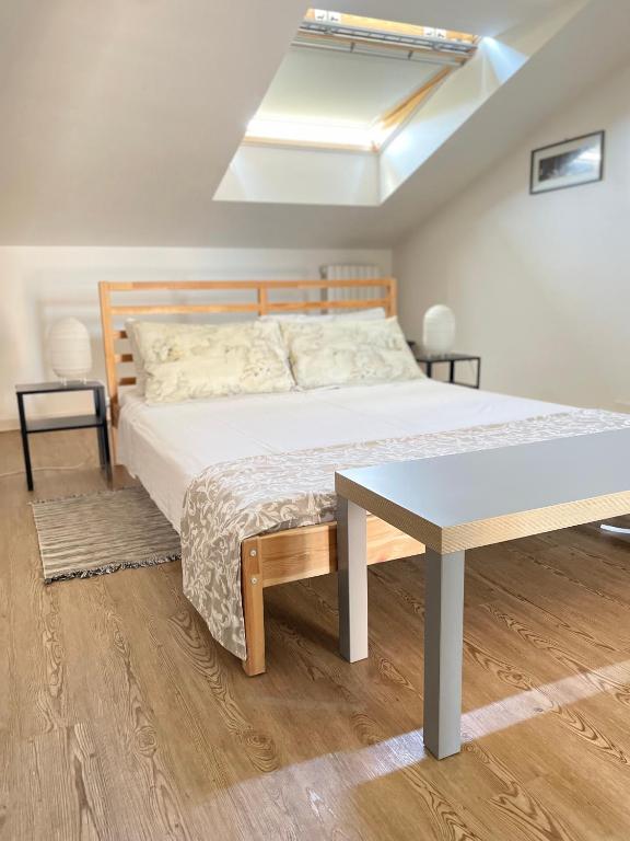Postel nebo postele na pokoji v ubytování Roof Pellegrini