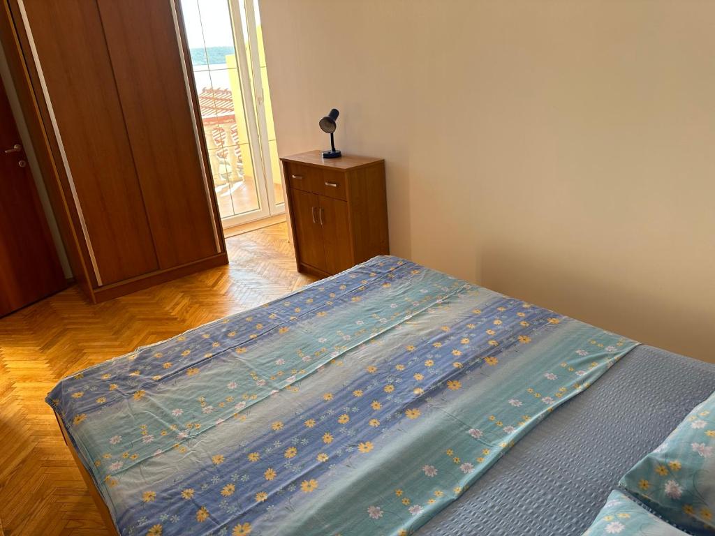 Posteľ alebo postele v izbe v ubytovaní Apartment 4 Persons - direct by the sea, 1st floor