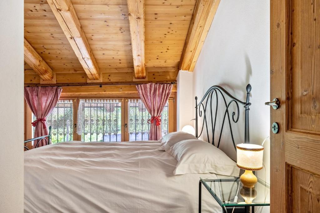 Katil atau katil-katil dalam bilik di Agritur Piazera Attico