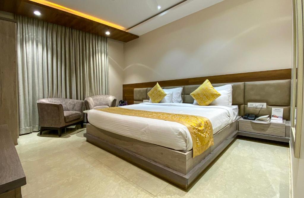 Ένα ή περισσότερα κρεβάτια σε δωμάτιο στο CENTRAL A BOUTIQUE HOTEL