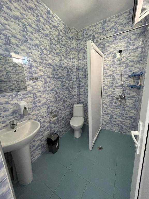 Koupelna v ubytování My House Kvariati