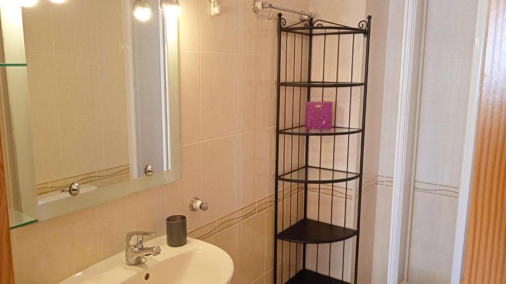 Koupelna v ubytování Apartamentos Capricho 3000