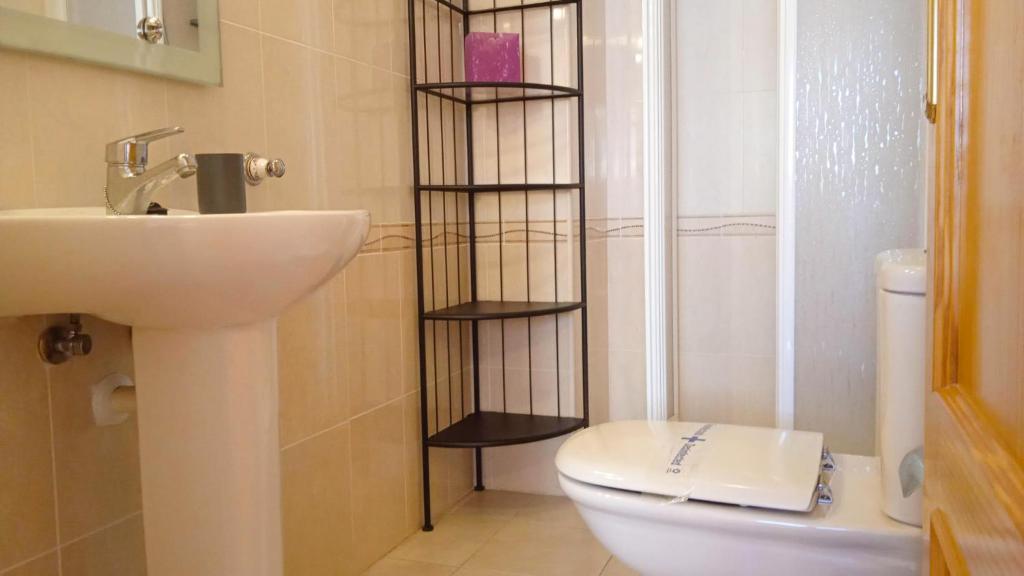 Koupelna v ubytování Apartamentos Capricho 3000