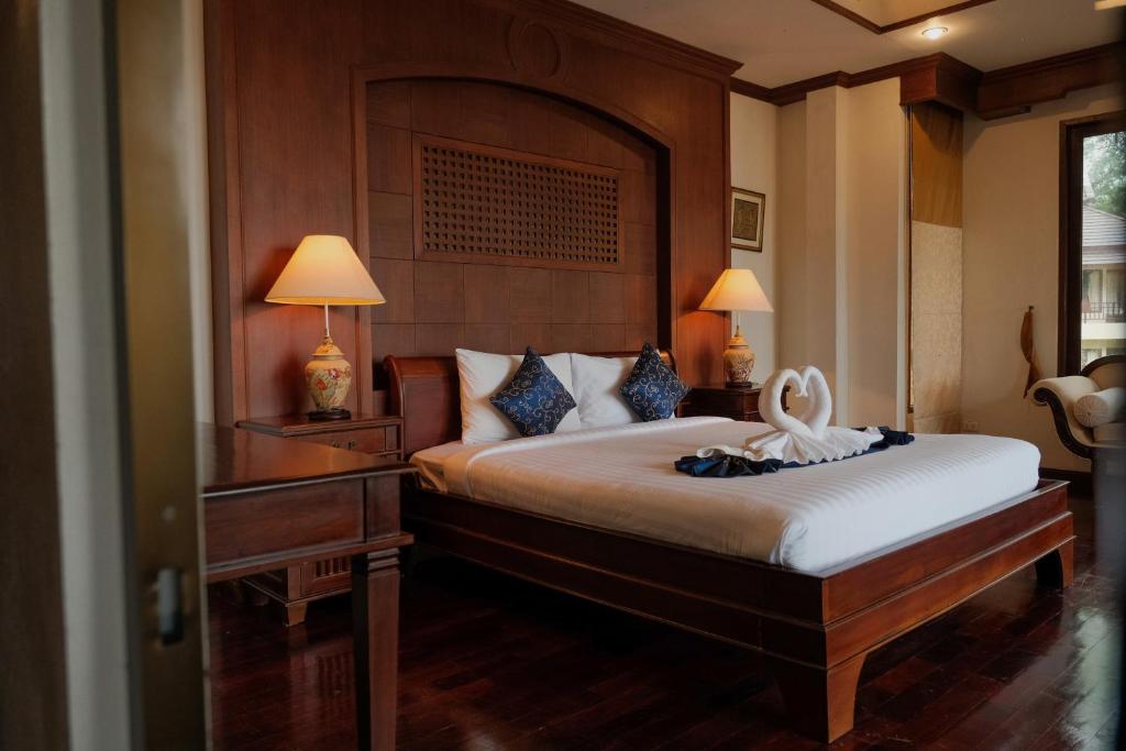 Postel nebo postele na pokoji v ubytování Kooncharaburi Resort - Koh Chang