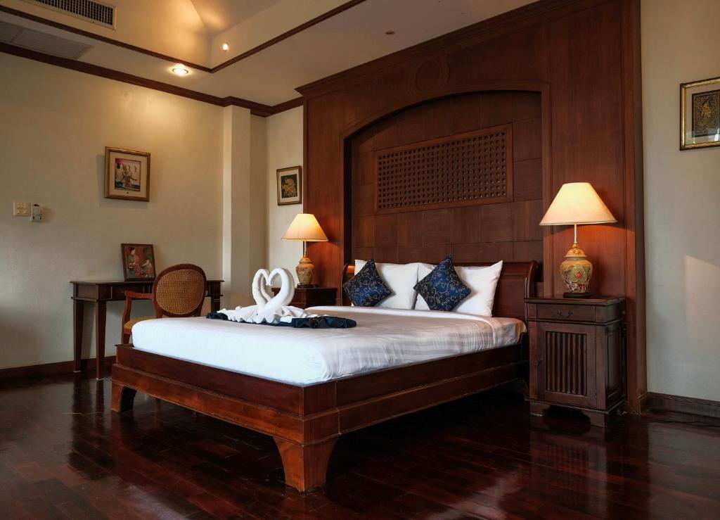 Postel nebo postele na pokoji v ubytování Kooncharaburi Resort - Koh Chang