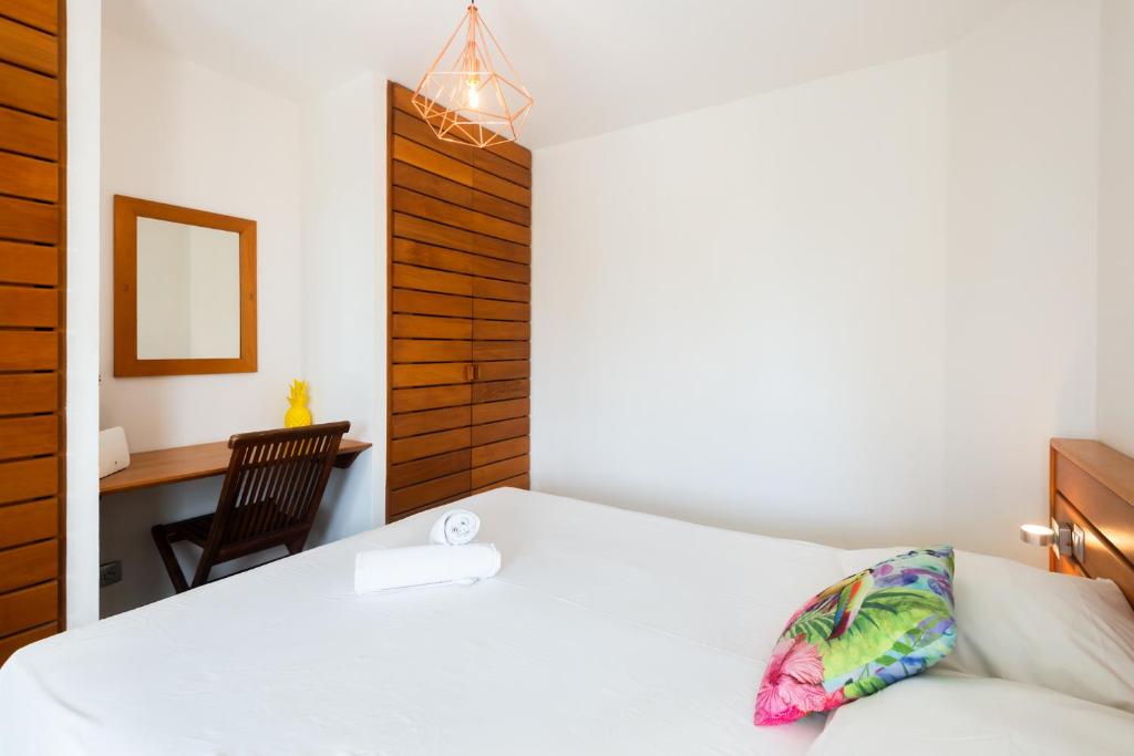 Postel nebo postele na pokoji v ubytování Tropical Cocooning
