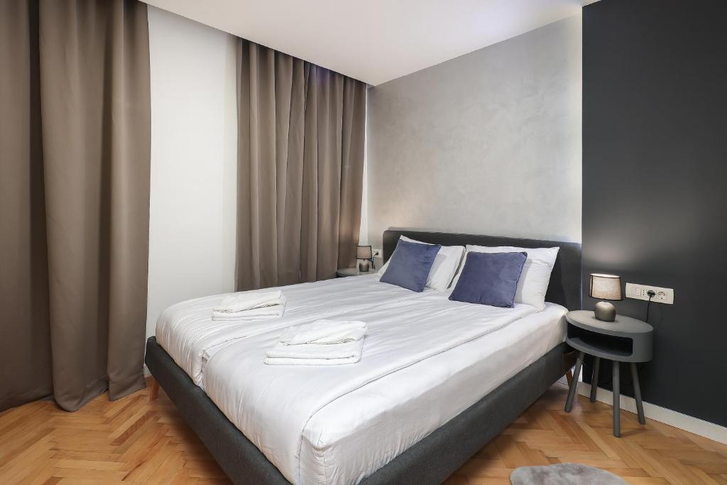 Posteľ alebo postele v izbe v ubytovaní Residence INN Rijeka