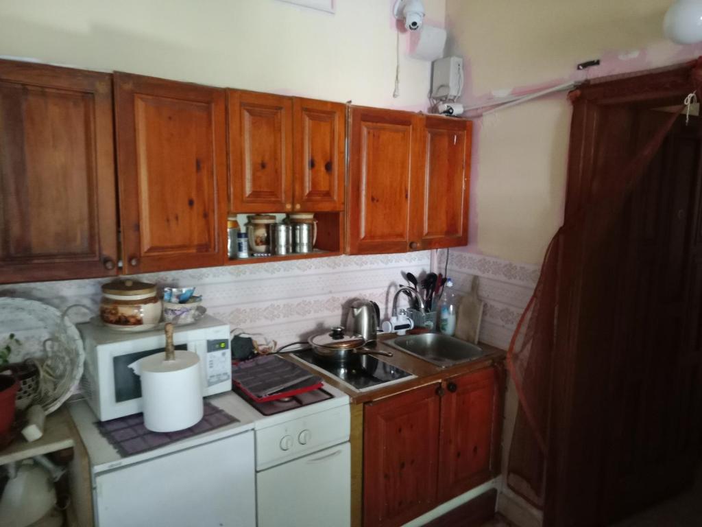 Kuchyňa alebo kuchynka v ubytovaní Centar Starog Grada
