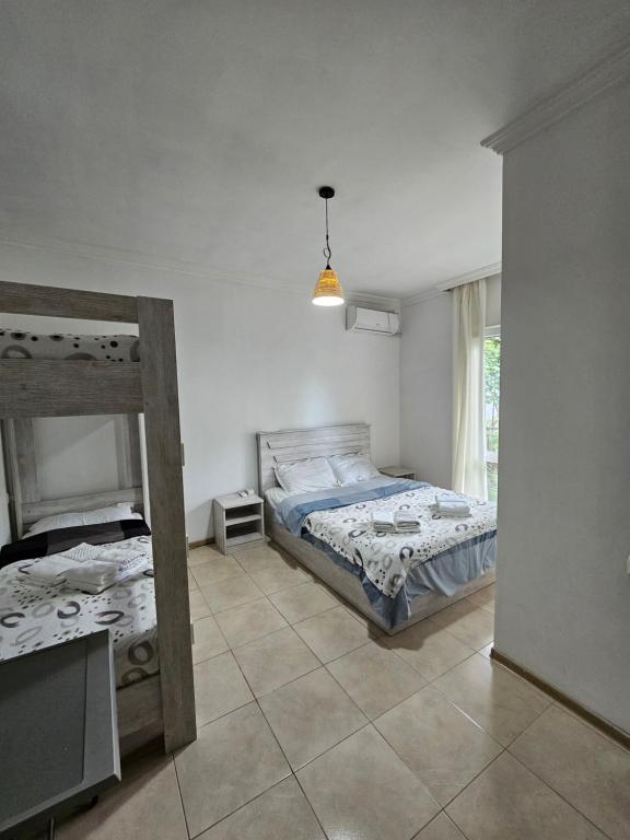 Postel nebo postele na pokoji v ubytování Guest house Junona