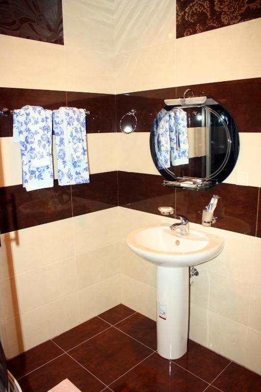 Koupelna v ubytování Christy Hotel
