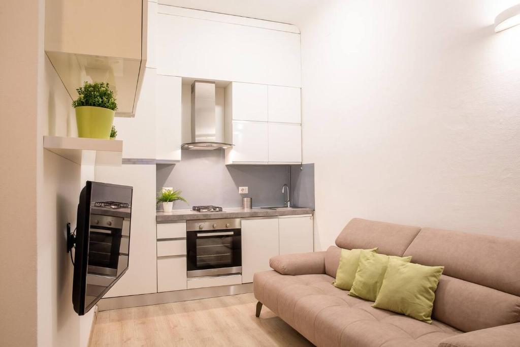 Кухня или мини-кухня в Appartamento Adda10

