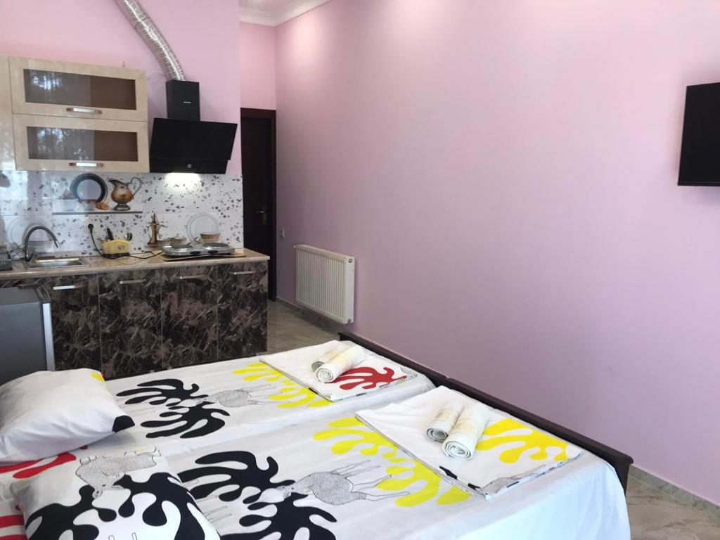Postel nebo postele na pokoji v ubytování THEODORE-Hotel