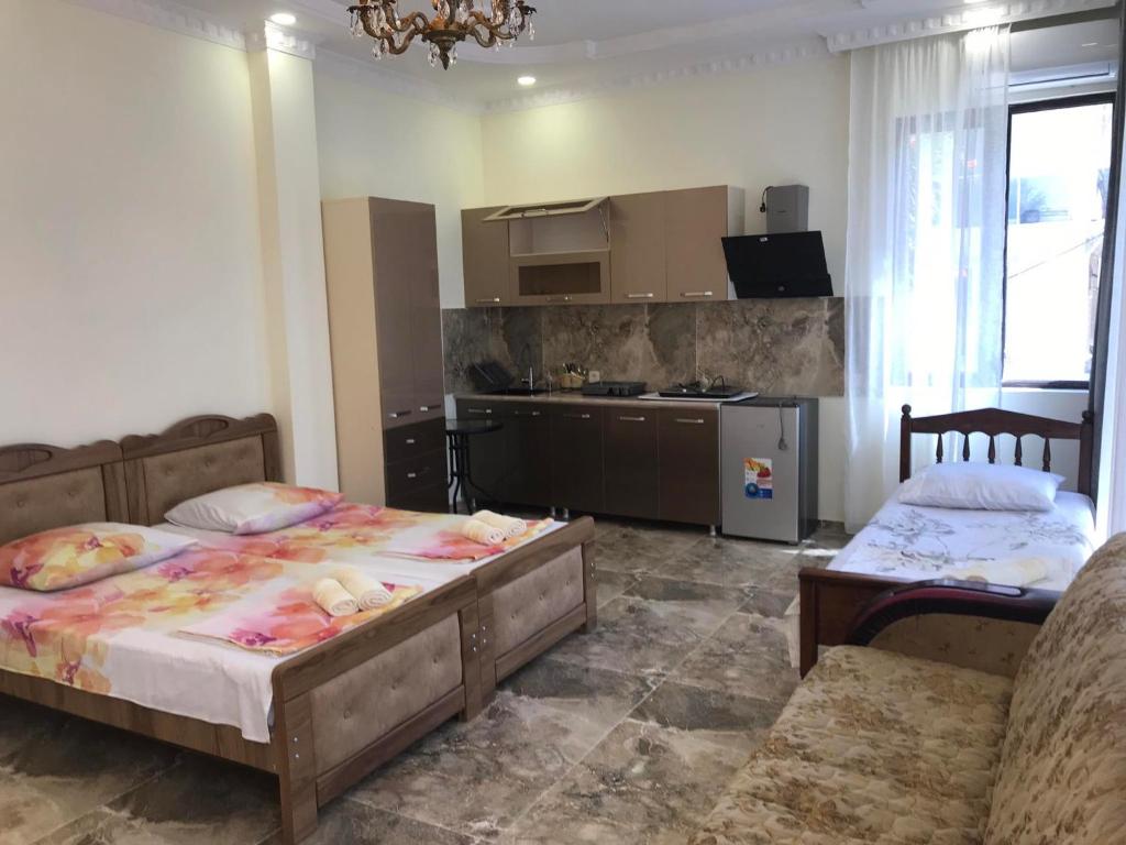 Postel nebo postele na pokoji v ubytování THEODORE-Hotel