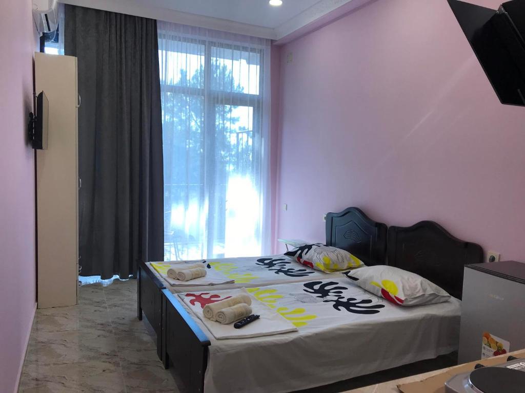 Postel nebo postele na pokoji v ubytování THEODORE-Hotel