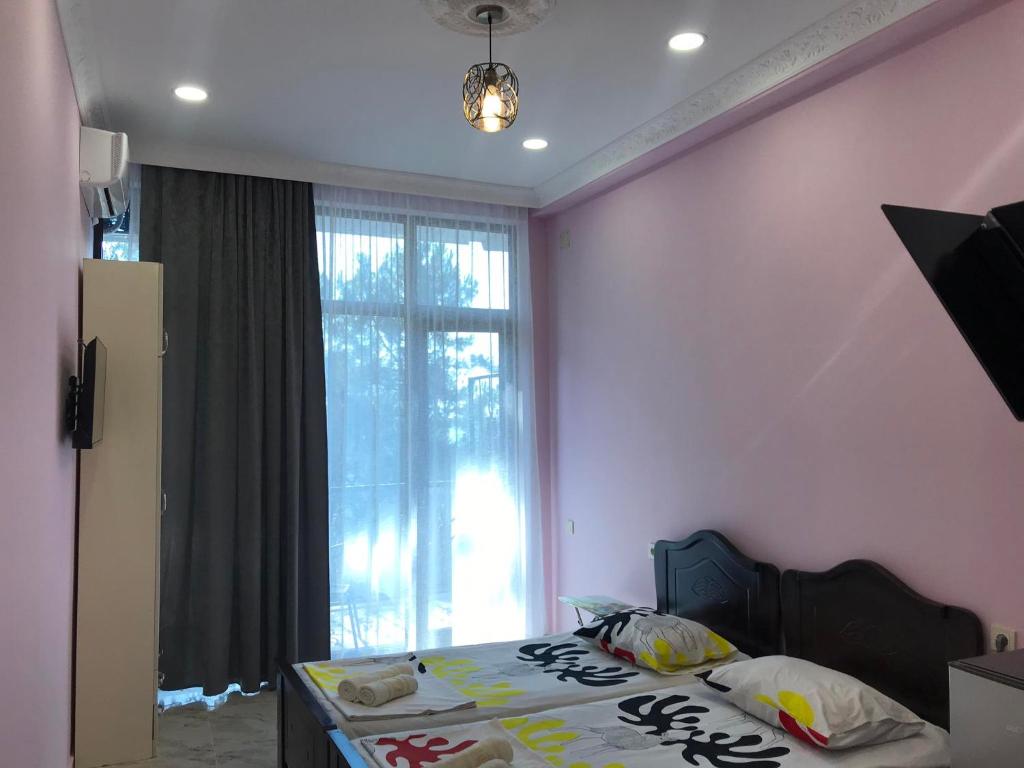 Postel nebo postele na pokoji v ubytování THEODORE-Hotel