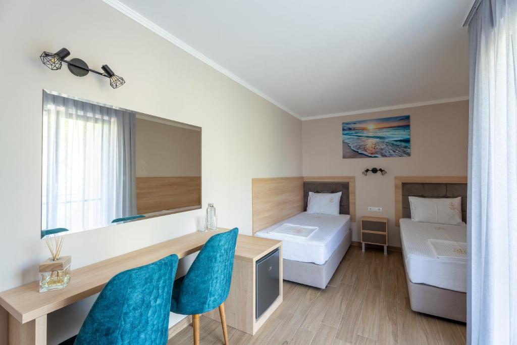 Postel nebo postele na pokoji v ubytování Touch Hotel