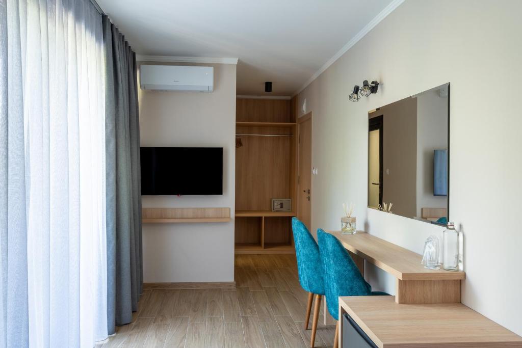 TV a/nebo společenská místnost v ubytování Touch Hotel