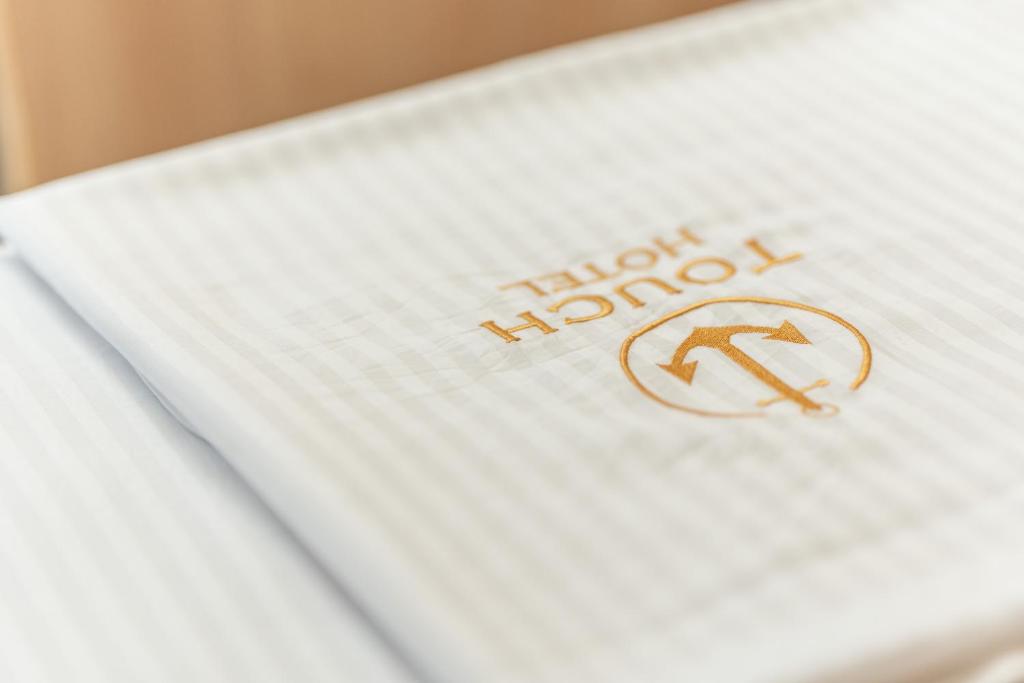 Certifikát, hodnocení, plakát nebo jiný dokument vystavený v ubytování Touch Hotel