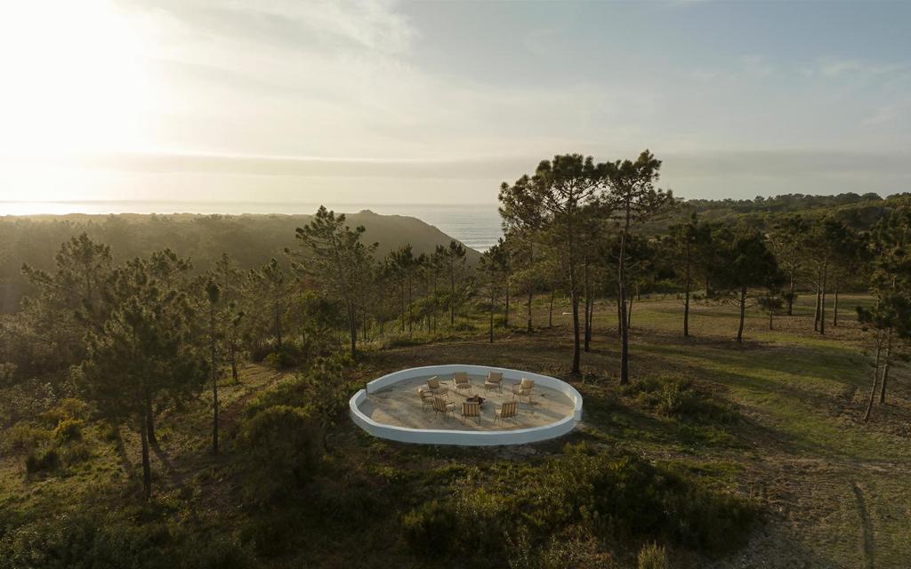 an aerial view of a bath tub in a field at Amaria in Aljezur