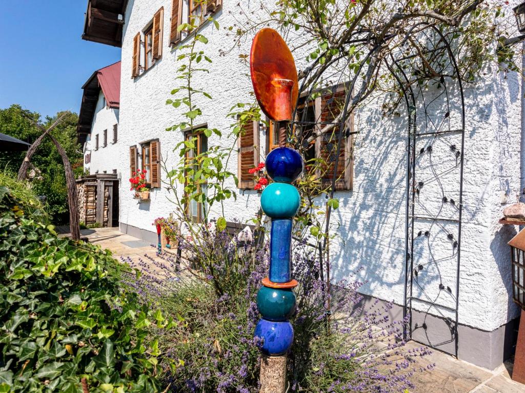 a colorful pole in front of a building at Haus Schlossblick in Bad Reichenhall