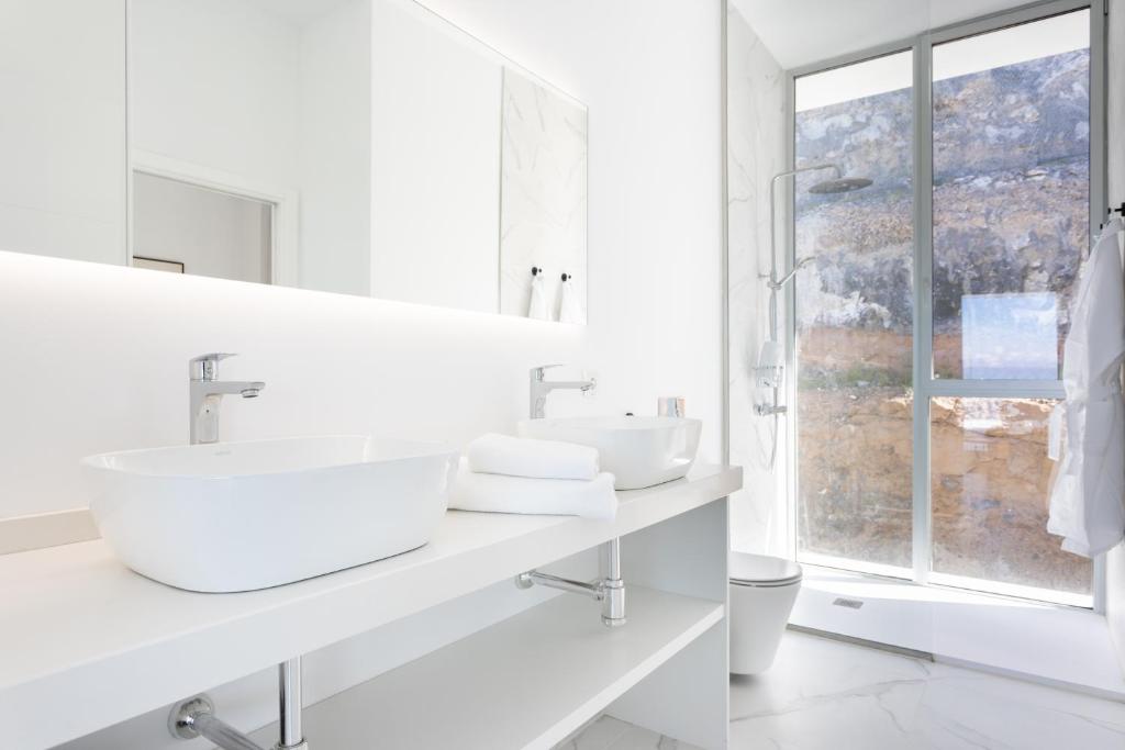 Fotografie z fotogalerie ubytování Crystal I Luxury Apartments by EnjoyaHome v destinaci Acantilado de los Gigantes