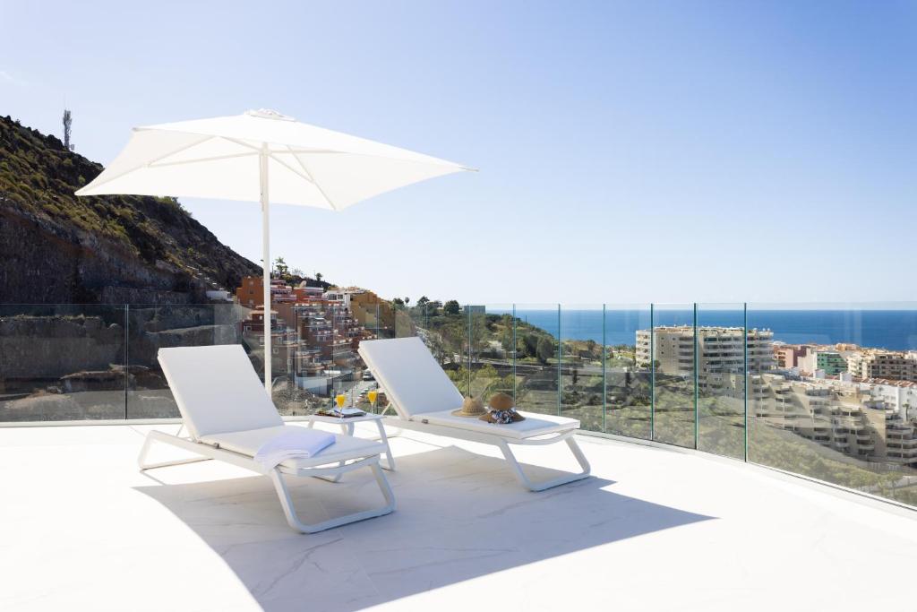 Fotografie z fotogalerie ubytování Crystal I Luxury Apartments by EnjoyaHome v destinaci Acantilado de los Gigantes