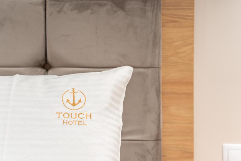 Postel nebo postele na pokoji v ubytování Touch Hotel