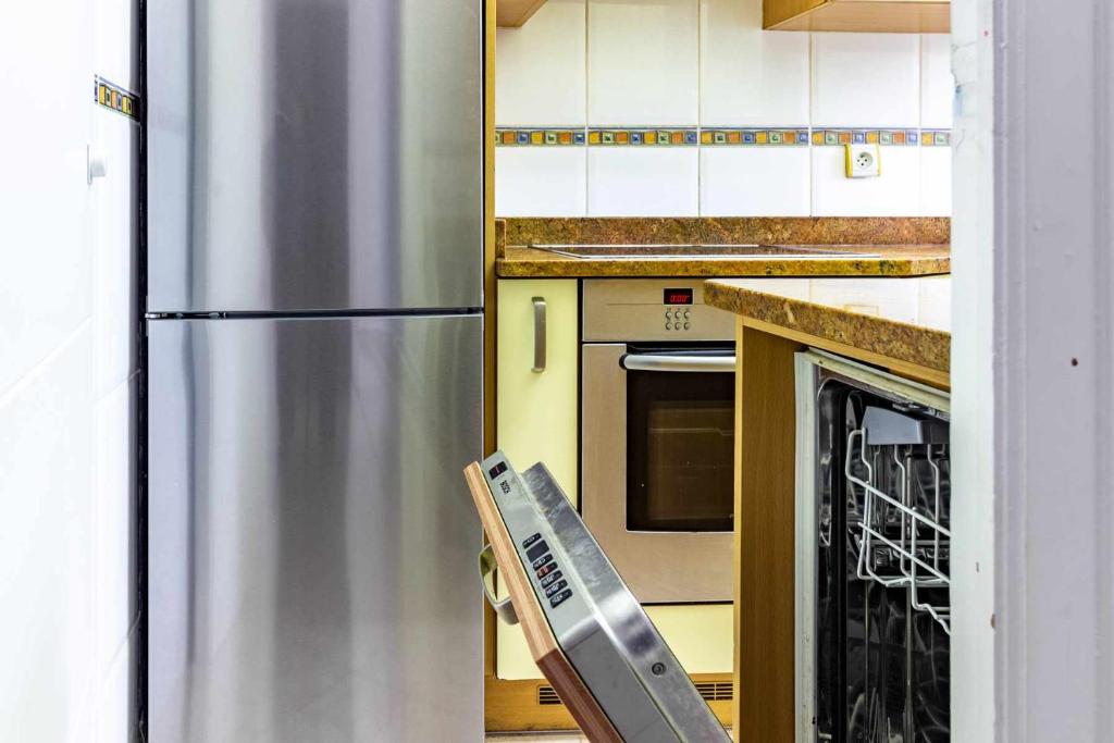 Kuchyňa alebo kuchynka v ubytovaní Les Algues Encantador apartamento en el centro