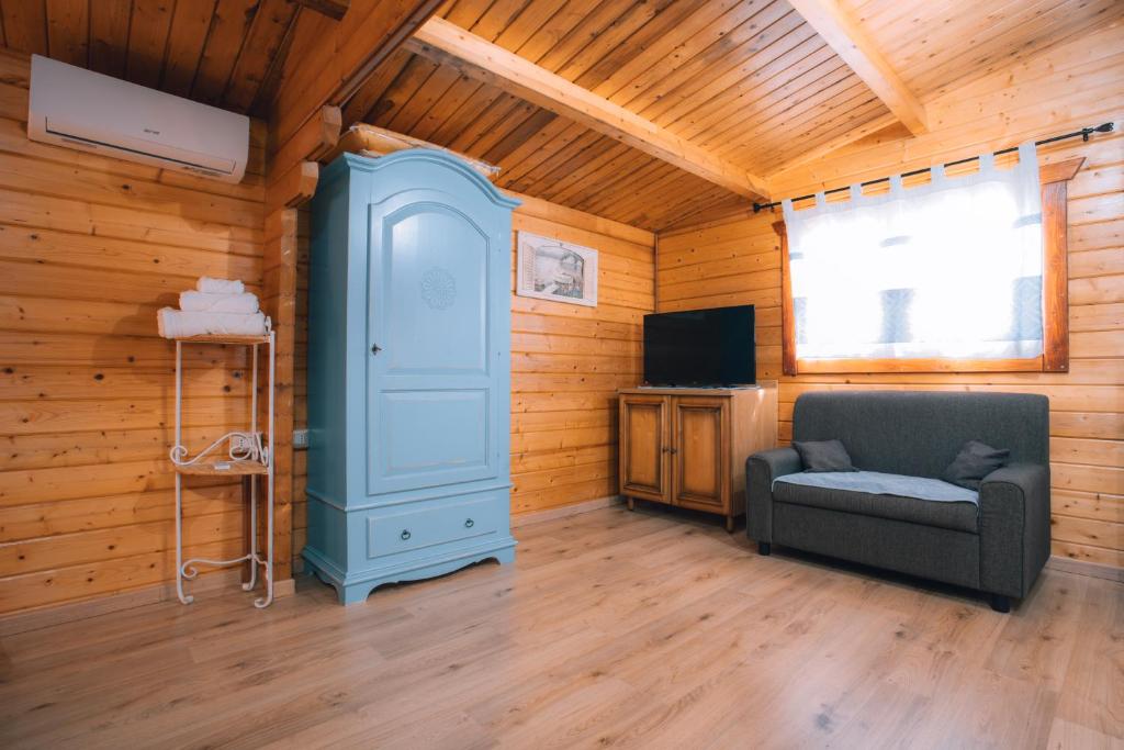 TV a/nebo společenská místnost v ubytování Chalet Sa Petra Ruja - Gadu e Tremene