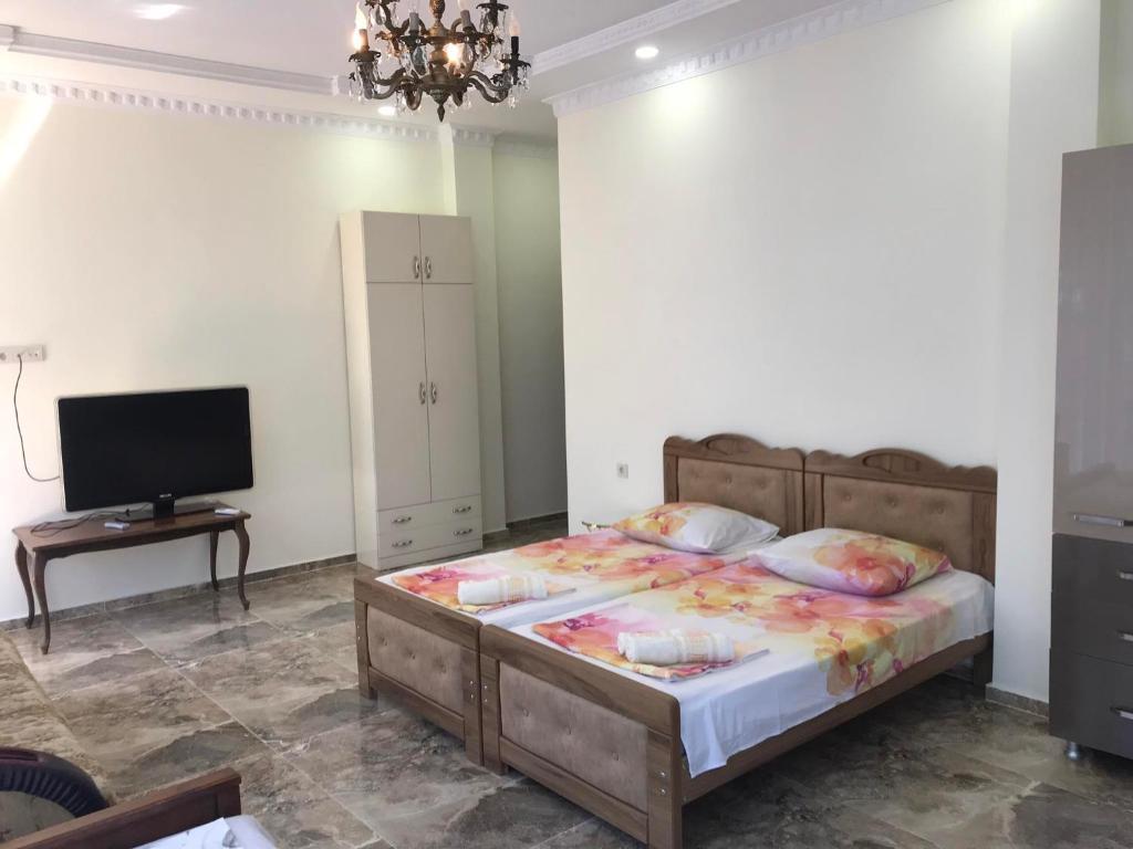 Postel nebo postele na pokoji v ubytování THEODORE-Hotel