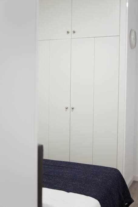 A bed or beds in a room at Comodo y agradable estudio en Madrid centro A5
