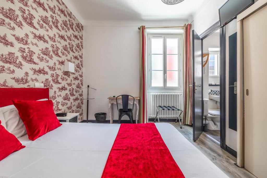 Postel nebo postele na pokoji v ubytování Hôtel Parc Mazon-Biarritz