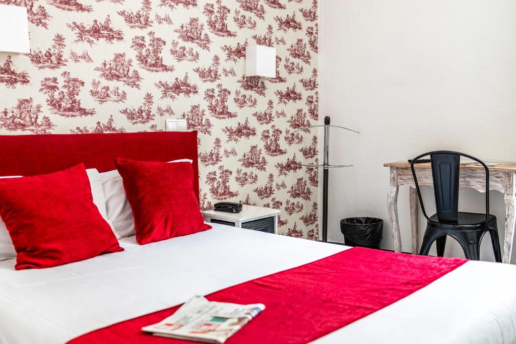 Postel nebo postele na pokoji v ubytování Hôtel Parc Mazon-Biarritz