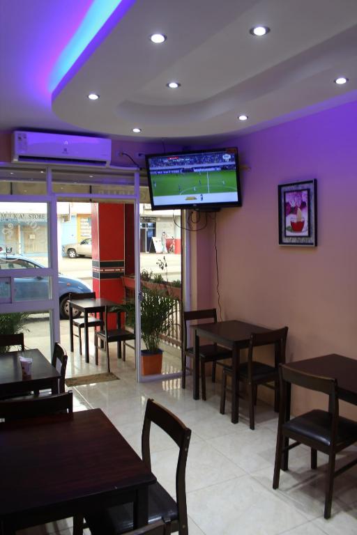 TV a/nebo společenská místnost v ubytování Hostal Rosa Mar