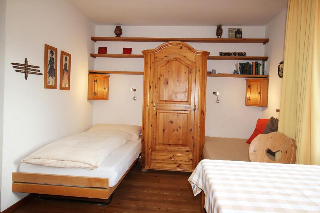 Ένα ή περισσότερα κρεβάτια σε δωμάτιο στο Residenza Lagrev Studio Nr 303 - Typ 10A - 3 Etage - Ost