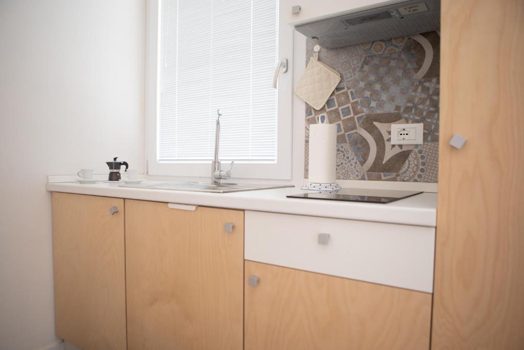 A kitchen or kitchenette at CASA MAIOLICA
