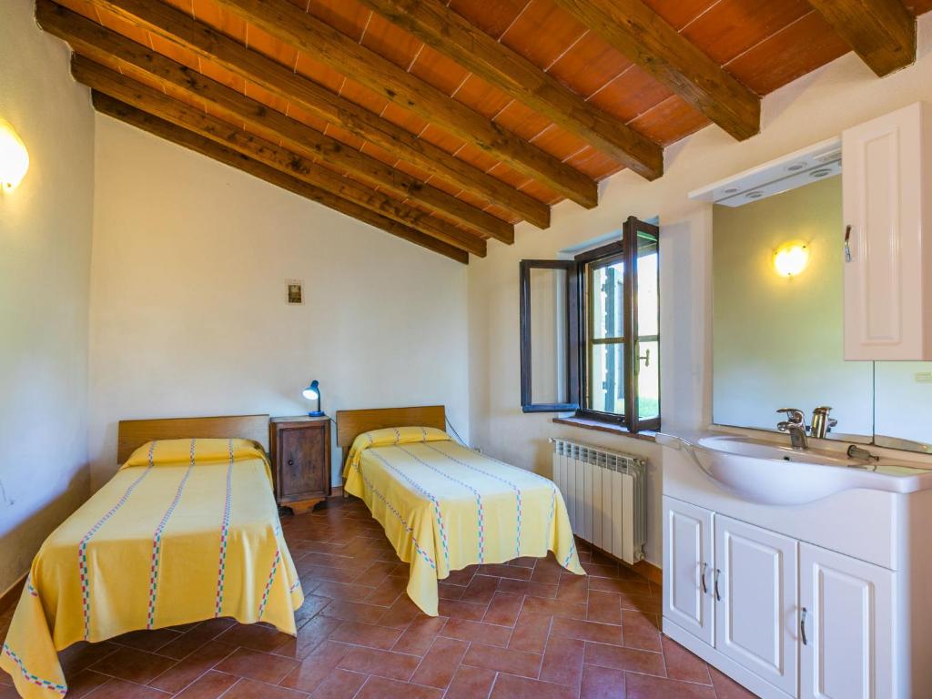 Posteľ alebo postele v izbe v ubytovaní Holiday Home Grilli by Interhome