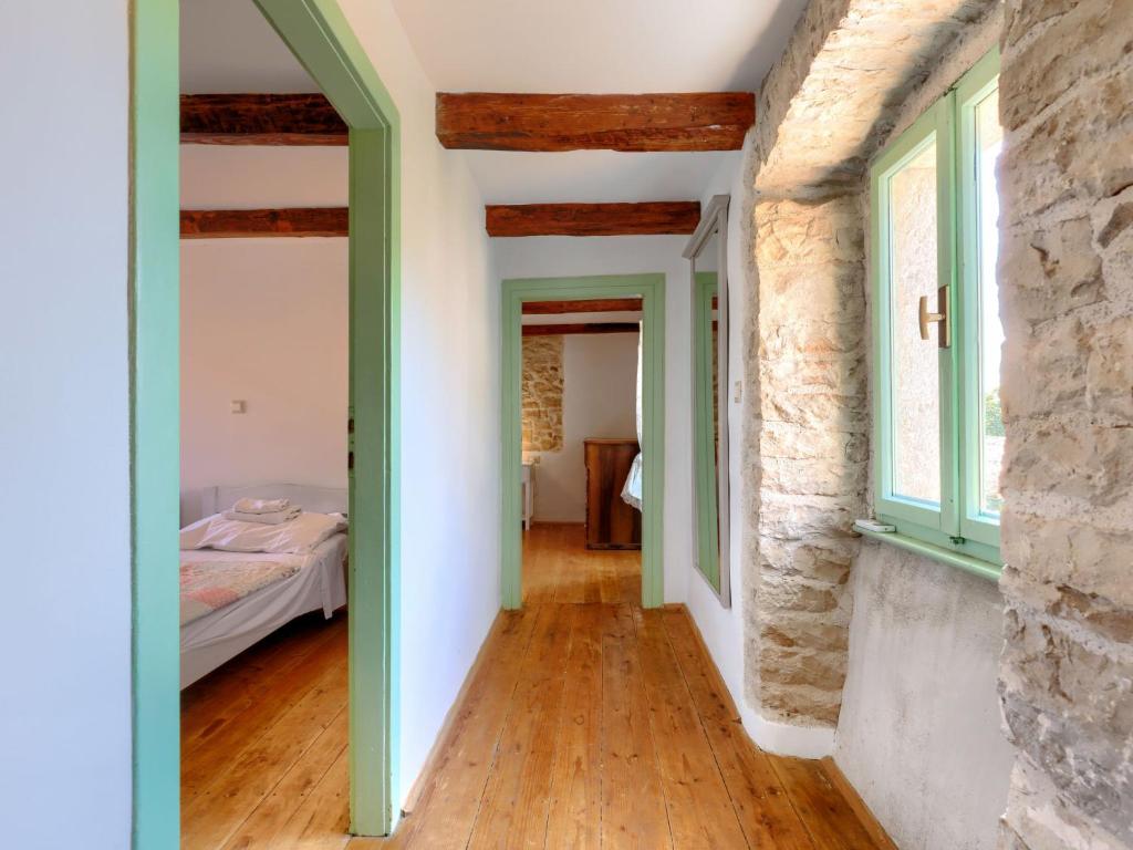 Postel nebo postele na pokoji v ubytování Holiday Home Pinia II by Interhome