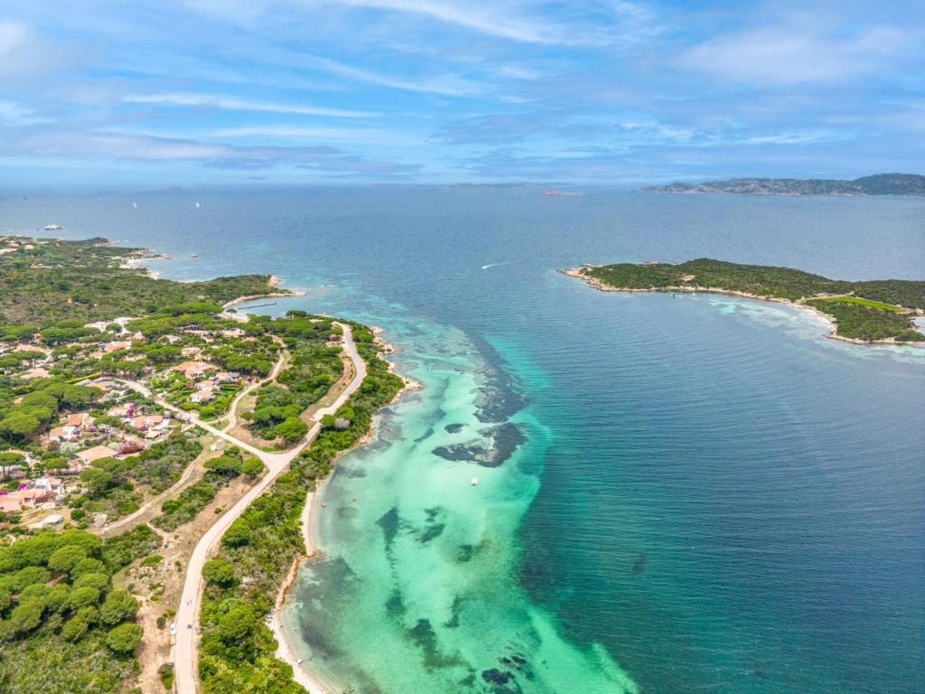 an aerial view of a beach with turquoise water at Holiday Home Bolina by Interhome in Conca Verde