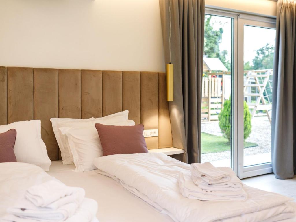 Łóżko lub łóżka w pokoju w obiekcie Holiday Home Villa Sonia by Interhome