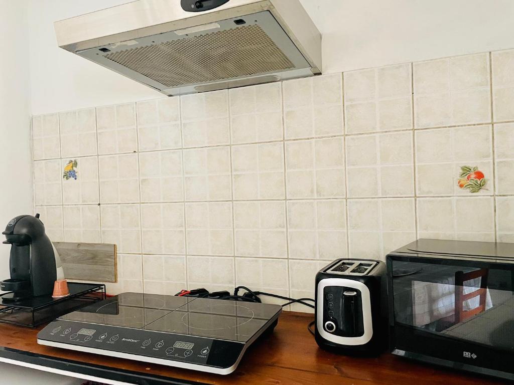 Kuchyňa alebo kuchynka v ubytovaní Casa Sikania