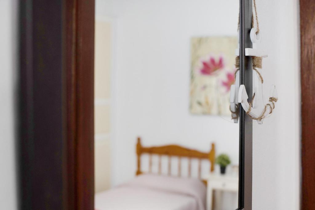 Postel nebo postele na pokoji v ubytování Apartamento Callao, La Graciosa